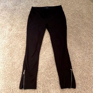 Elastic waist leggings with zippered bottoms